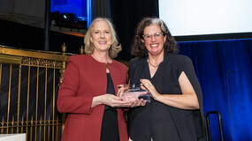 Dean Heather K. Gerken presents the inaugural Changemaker Award to Becca M. Heller ’10