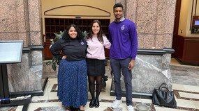 3 people standing the CT state capitol